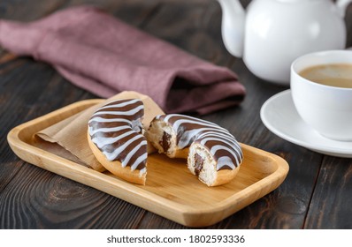 Chocolate donut on wooden plate - Powered by Shutterstock