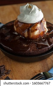 Chocolate Double Fudge Brownie, Ala Mode.  Homemade Brownie Topped With Vanilla Bean Ice Cream, Chocolate Syrup Whipped Cream And Hot Chocolate Syrup. 