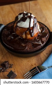 Chocolate Double Fudge Brownie, Ala Mode.  Homemade Brownie Topped With Vanilla Bean Ice Cream, Chocolate Syrup Whipped Cream And Hot Chocolate Syrup. 