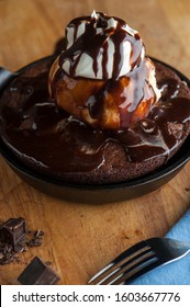 Chocolate Double Fudge Brownie, Ala Mode.  Homemade Brownie Topped With Vanilla Bean Ice Cream, Chocolate Syrup Whipped Cream And Hot Chocolate Syrup. 