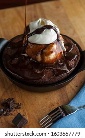 Chocolate Double Fudge Brownie, Ala Mode.  Homemade Brownie Topped With Vanilla Bean Ice Cream, Chocolate Syrup Whipped Cream And Hot Chocolate Syrup. 