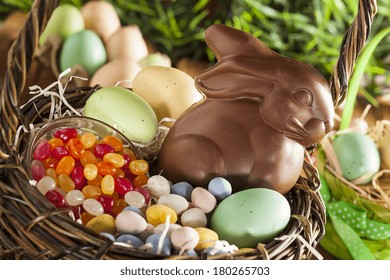 Chocolate Easter Bunny In A Basket With Assorted Candy