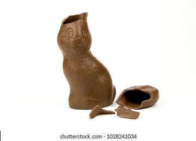 Chocolate Easter Bunny With Broken Ears Isolated On White