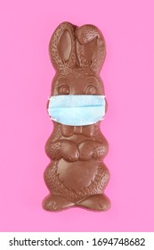 Chocolate Easter Bunny Wearing A Medical Face Mask.