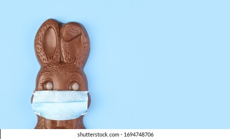 Chocolate Easter Bunny Wearing A Medical Face Mask.