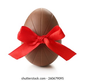 Chocolate Easter Egg With Color Ribbon Bow Isolated On White