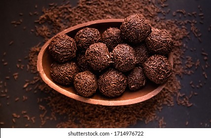 Chocolate Easter Egg Filled With Brigadeiro (brigadier), Goumert Egg Chocolate Tradition In Brazil. 