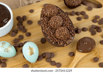 Chocolate Easter egg filled with chocolate ganache. Easter egg with brigadeiro. (Contains the phrase 