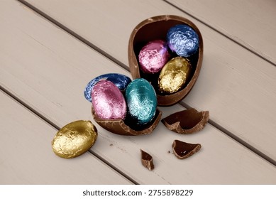 Chocolate easter egg on desk backgrouund