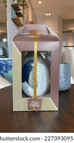 chocolate easter egg painted by hands homemade inside a gift box