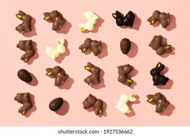 Chocolate Easter Eggs and Bunnies on pink background pattern, flat lay - Powered by Shutterstock