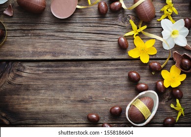 Chocolate Easter Eggs On Dark Wooden Background