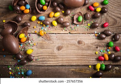 Chocolate Easter Eggs Over Wooden Background - Shutterstock ID 257657356