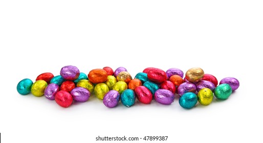 Chocolate Eggs In Foil Isolated On White Background