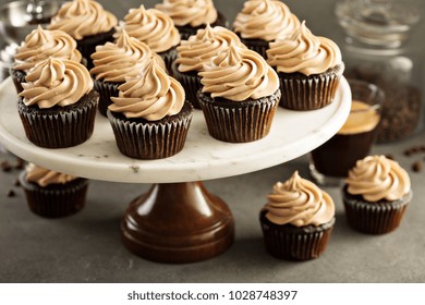 Chocolate Espresso Cupcakes On A Cake Stand With Coffee Beans