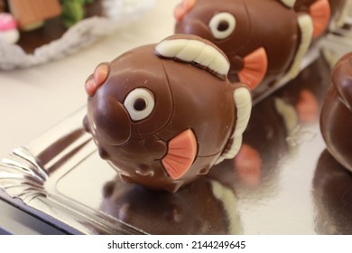 Chocolate figure in the shape of a fish or a blowfish. Chocolate pieces to put on top of the Mona de Pascua cake. Typical tradition of the easter holidays in the Spanish and Catalan culture.