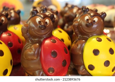 Chocolate figure in the shape of a red and yellow ladybug. Chocolate pieces to put on top of the Mona de Pascua cake. Typical tradition of the easter holidays in the Spanish and Catalan culture.