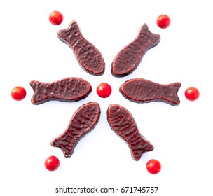 Chocolate fish arranged in seasonal snowflake pattern - kiwiana confectionery lollies in New Zealand, NZ