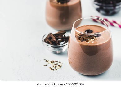 Chocolate frozen cherry chia seeds smoothie. Selective focus, space for text.