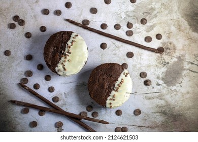 Chocolate Fudge Cookie Sandwich With White Chocolate Decoration