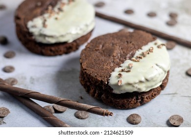 Chocolate Fudge Cookie Sandwich With White Chocolate Decoration