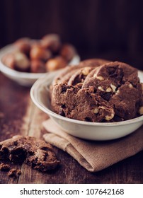 Chocolate And Hazelnut Cookies In A Small Bowl