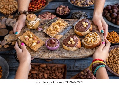 Chocolate Hazelnut Spread And Peanut Butter On The Bread. Serving And Sharing Foo With Table Top View. 