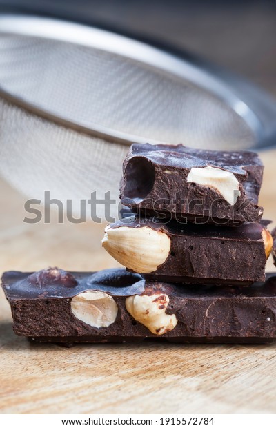 chocolate with hazelnuts broken into pieces,\
pieces of chocolate with hazelnuts and cocoa products, divided into\
pieces of chocolate with whole\
nuts