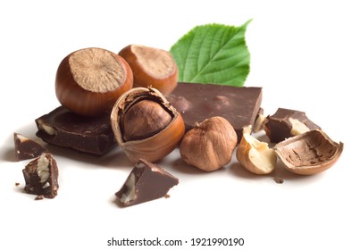 Chocolate with hazelnuts on a white background.