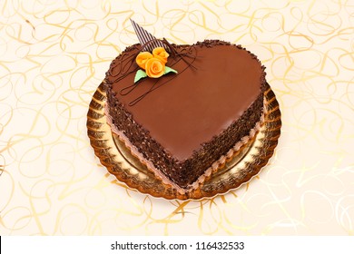 Chocolate Heart Cake On Golden Background