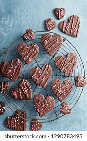 Chocolate Hearts Cookies For Valentines Day With Glaze And Sprinkles Overhead Shot