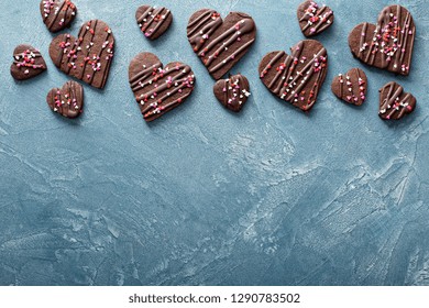 Chocolate Hearts Cookies For Valentines Day With Glaze And Sprinkles Overhead Shot With Copy Space