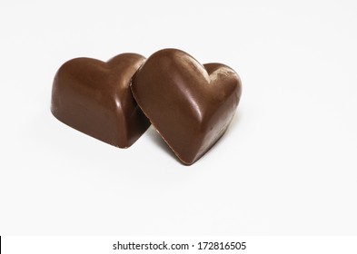 Chocolate Hearts On White Background