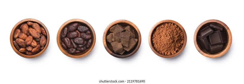 Chocolate ingredients in wooden bowls, cocoa beans, chocolate mass, cocoa powder, chocolate bars. Flat lay isolated on white background.