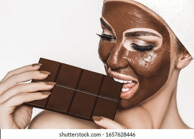 Chocolate Luxury Spa. Woman with chocolate Facial Mask .Chocolate Mask Facial Spa. Beauty concept.