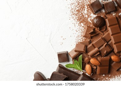 Chocolate, Melted Chocolate, Coffee And Almond On White Background