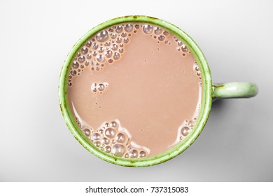 Chocolate Milk In Green Glass From Above. Top View. Milk For Health.