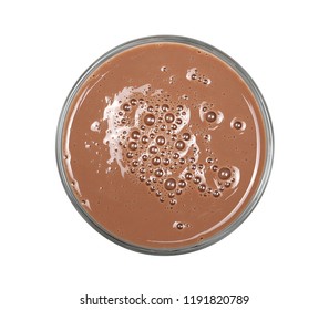 Chocolate Milk Puddle In Glass Isolated On White Background, Top View