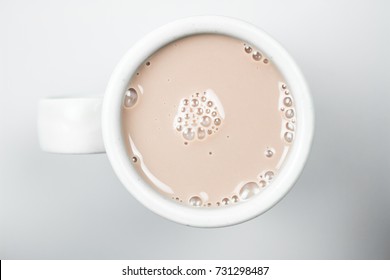 Chocolate Milk In White Glass From Above. Top View. Milk For Health.