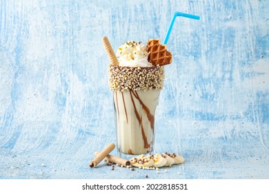 Chocolate Milkshake With Banana On Blue Background