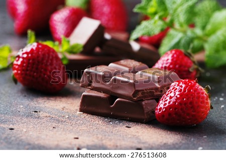 Chocolate with mint and strawberry, selective focus