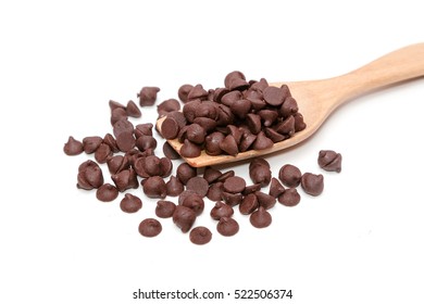 Chocolate morsels on wooden spoon isolate on white - Powered by Shutterstock