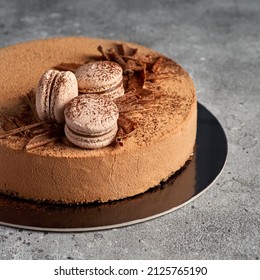 chocolate mousse cake, dessert milk chocolate velours on gray background. Modern European cake. french cuisine