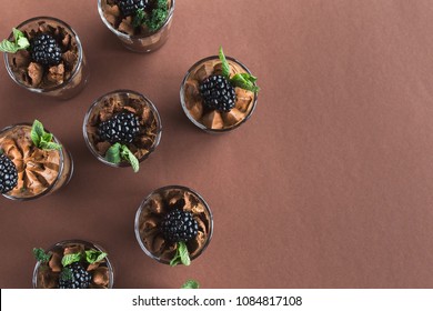 Chocolate Mousse In Glasses, Top View. Desserts As Part Of Party Dessert Stand. Candy Bar And Catering Concept For Birthday, Wedding And Other Holiday Celebration, Copy Space