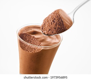 Chocolate mousse spoon and Chocolate mousse glass on a white background