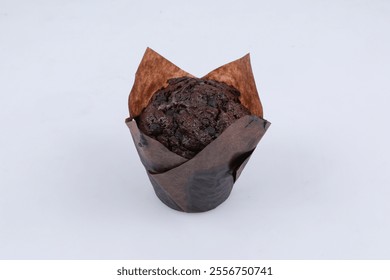 chocolate muffin on a white isolated background