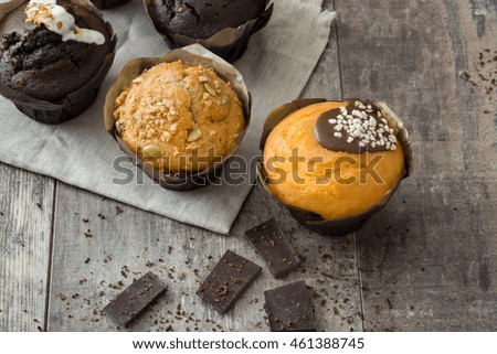 Similar – top view of assorted fresh tasty muffins