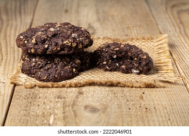 Chocolate Oatmeal Cookies On Wooden Table