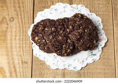 Chocolate Oatmeal Cookies On Wooden Table