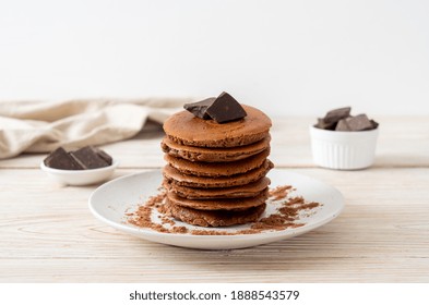 Chocolate Pancake Stack With Chocolate Powder